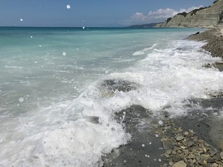 waves crashing on beach