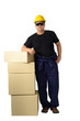 © sirastock - worker in Mechanic Jumpsuit with stack of boxes isolated on white background