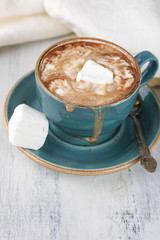 Wall Mural - Hot coffee with whipped cream and marshmallow