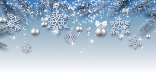 Christmas and New Year shiny banner with silver Christmas balls and snowflakes.