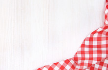Kitchen Red Checkered Table Cloth Frame On White Wooden Empty Space Background.