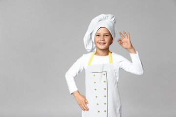 Sticker - Cute little chef on grey background