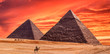 Panorama of the area with the great pyramids of Giza at amazing sunset, Egypt