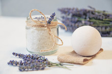 Natural Herbal Sea Salt With Aromatic Lavender - Perfect For Relaxation. Cosmetic Jars And Bottles With Salt, Lavender Flowers, Bath Bomb