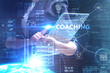 © Egor - The concept of business, technology, the Internet and the network. A young entrepreneur working on a virtual screen of the future and sees the inscription: coaching