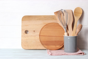 set of kitchenware on wooden background. Cooking appliances.