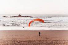 Paragliding On The Beach In The Legzira Of Morocco