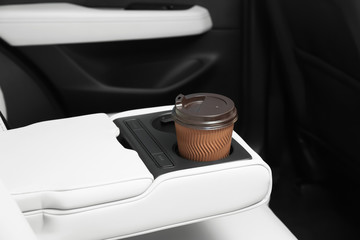 Sticker - Takeaway paper coffee cup in holder inside car