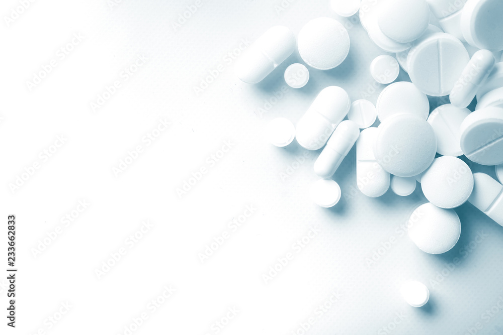 Pharmacy theme, white medicine tablets antibiotic pills.