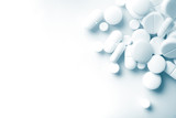 Fototapeta Boho - Pharmacy theme, white medicine tablets antibiotic pills.