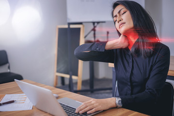 Working woman face suffering because of neck painful