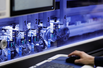 Poster - engineer controls the operation of the machine