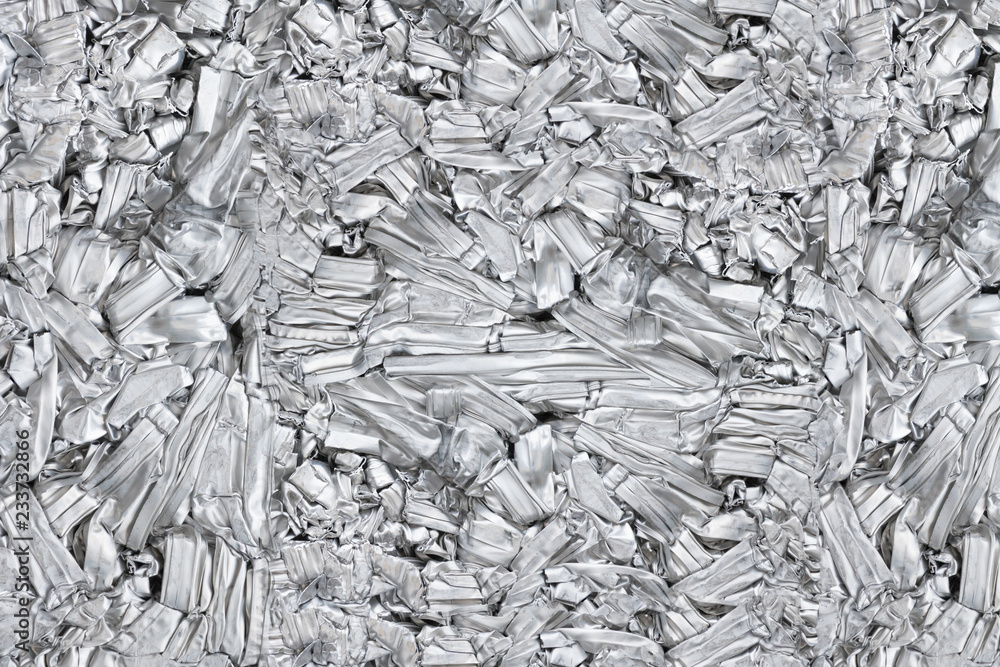 pressed aluminum scrap background and texture, silver metal recycling. - obrazy, fototapety, plakaty 
