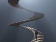 © Photobank - man climbs the spiral staircase