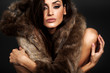 © Iván Antúnez - Young woman in brown fur coat