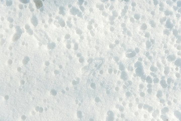 Winter texture, snow background. Patterns on the snow.background with copy space