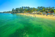 Spectacular Paradise Cove In Malibu, California, United States With Turquoise Waters Seen From Paradise Cove Pier. Luxurious Travel Destination On Pacific Coast. Little Dume Beach In The Distance.