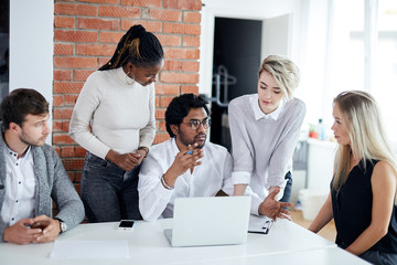 man and his team are thinking about problems in industry. close up photo. office workers analyzing the problems of the company