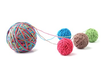 Wall Mural - colorful cotton big thread ball from four color thread isolated on white background. different color