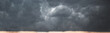 © nataliazakharova - Panorama of cloudy terrifying dark sky before  thunderstorm. Dark dramatic stormy rainy sky.