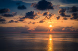 Fototapeta Zachód słońca - Aerial view of beautiful amazing sea sunset with color dramatic sky