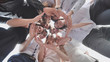 © Довидович Михаил - A group of high school students look through the shape of a circle created from their palms. The concept of friendly friends.