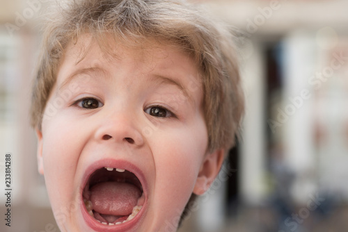 Unleashing His Emotions Little Child With Stylish Haircut Little