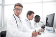 © ASDF - group of doctors conducting laboratory studies