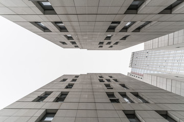 Wall Mural - Skyscrapers from a low angle view of unrecognized modern buildings