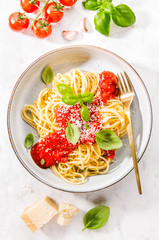 Pasta with tomato sauce and parmesan