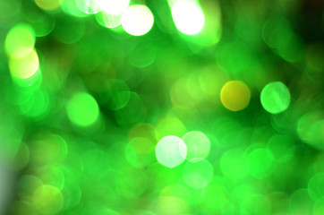 Wall Mural - Green bokeh lights defocused background