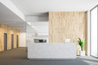 Concrete reception in wooden office