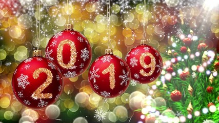 Wall Mural - red balls with numbers 2019 hanging on the background of a gold bokeh and a rotating christmas tree 
