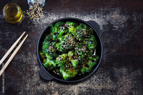 Broccoli baked in a cast iron skillet. Healthy Chinese style food ...