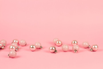 Fashion сhristmas decoration on pink background. Closeup of pink christmas . Trendy minimal concep. pastel color