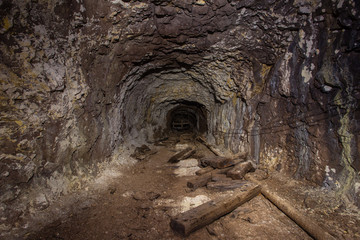 Underground abandoned gold iron ore mine shaft tunnel gallery passage