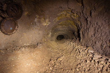 Underground abandoned gold iron ore mine shaft tunnel gallery passage