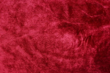 velvet texture background red color. christmas festive baskground. expensive luxury, fabric, materia