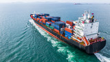 Aerial view cargo container ship sailing, container cargo ship in import export and business logistic and transportation of international by container ship, view from above business background.