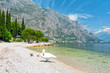© lukaszimilena - beautiful view on lake Garda with swan in Limone sul Garda, Italy