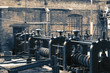 Victorian machine workshop factory with metal press machines with colour toning