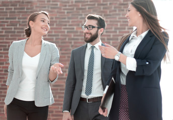 Sticker - group of employees on the background of the office