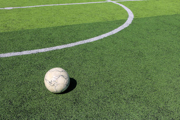 Wall Mural - Football on artificial turf. It is for green background in a stadium