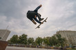 A skateboarder performs a stunt 