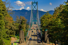 Lions Gate Suspension Bridge Or First Narrows Bridge In Stanley Park Vancouver Canada With Traffic