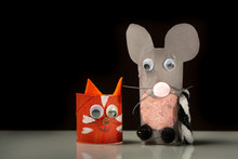 A Red Cat And A Grey Mouse Made Of Toilet Paper Roll By A Child