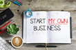Start my own business decision written on personal agenda, goal or resolution for the new year
