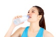 © N_studio - Beautiful portrait asian young woman in sport clothing drink bottle of water for healthy isolated on white background, girl with fit thirsty after exercise and fitness, health concept.