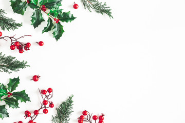 christmas composition. frame made of christmas plants on white background. flat lay, top view, copy 