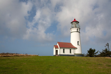 Wall Mural - lighthouse on coast of sea